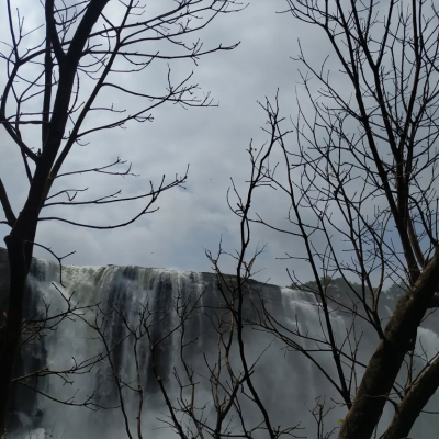 Surfing into the sunset in Carcavelos, Portugal